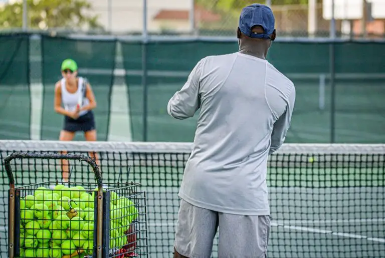 What Does A Tennis Coach Do Roles And Responsibilities Guide Racket