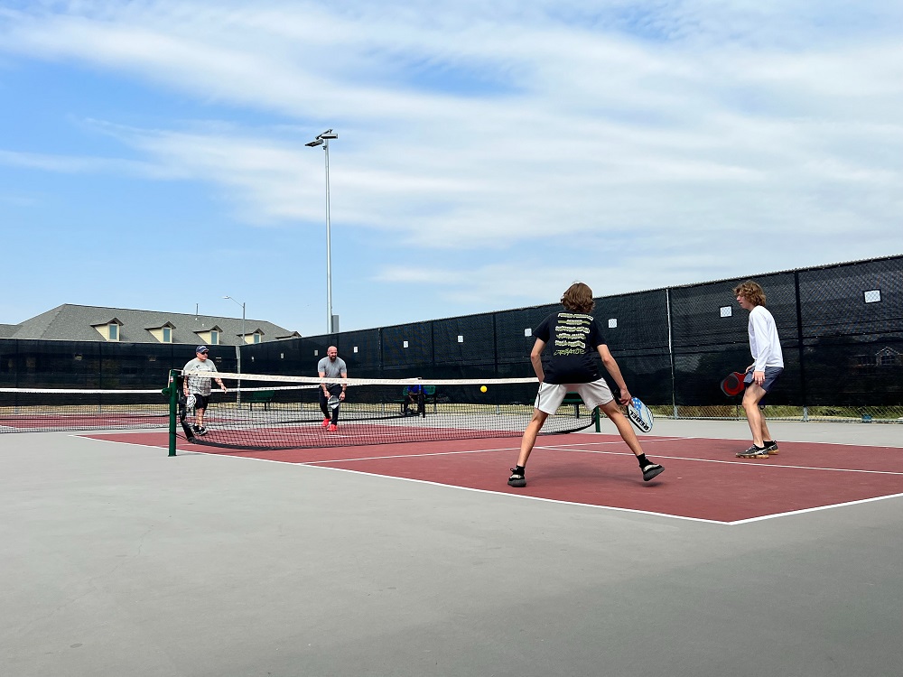 Which muscle groups are in action while playing pickleball?